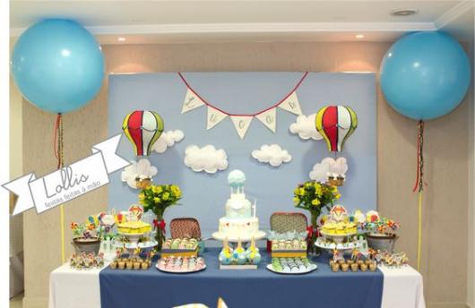 Party decoration with clouds, balloons and little flags.