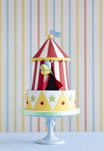 Cake shaped like a circus tent.