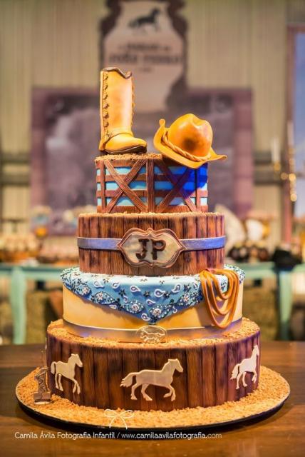 Cowboy cake, with boot and hat on top.