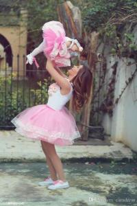Mother and daughter dress in pink, used with sneakers