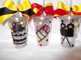 Acrylic glasses with a cinema motif as party favors.