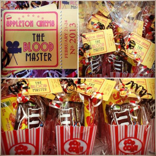 Popcorn bags filled with candy as movie/hollywood party favors