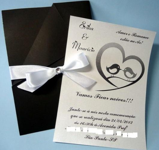 Simple black and white engagement invitations with ribbon clasp