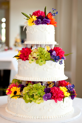 wedding cake with flowers on table