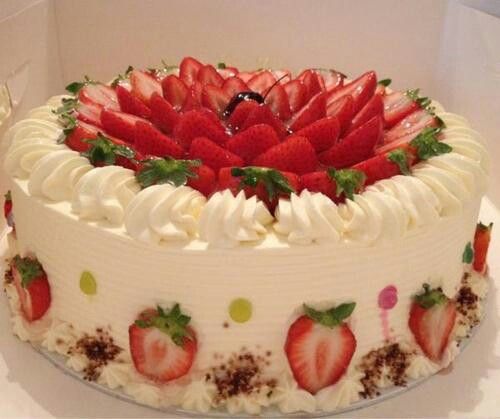 Cake Decorated with Fruits and Whipped Cream
