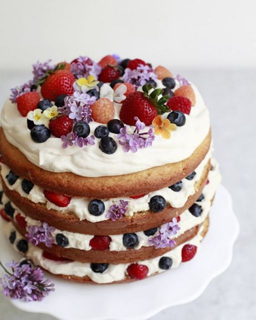 Cake Decorated with Fruits with Purple Flowers