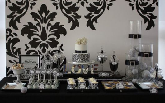 female 40th birthday party black and white decoration