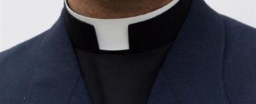 Is it illegal to wear a priest collar?