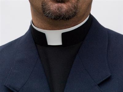 Is it illegal to wear a priest collar?
