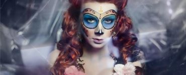 What does a masquerade ball symbolize?