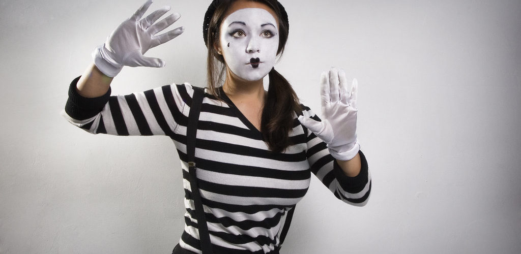 Why are mimes faces white?