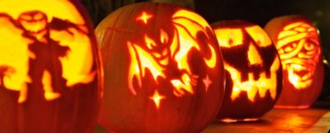 Why are pumpkins carved at Halloween?
