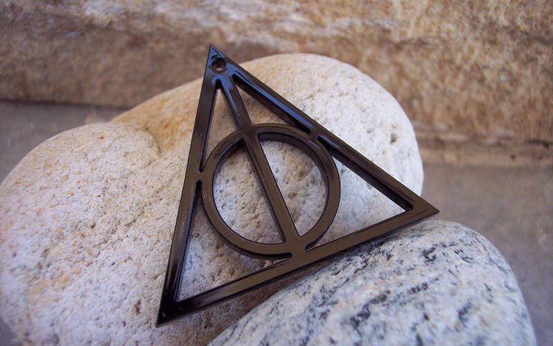 Why do people wear the Deathly Hallow symbol?