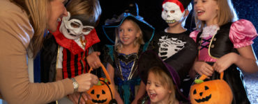 Why does kids say trick-or-treat?